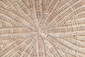 Circular weave rattan pattern, round rattan furniture background light brown texture, weave rattan